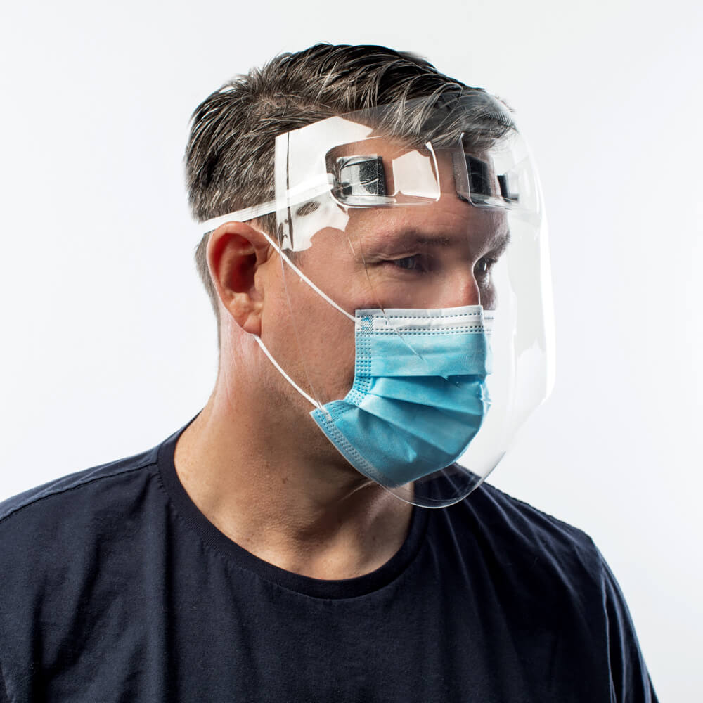 Female medical professional wearing face shield