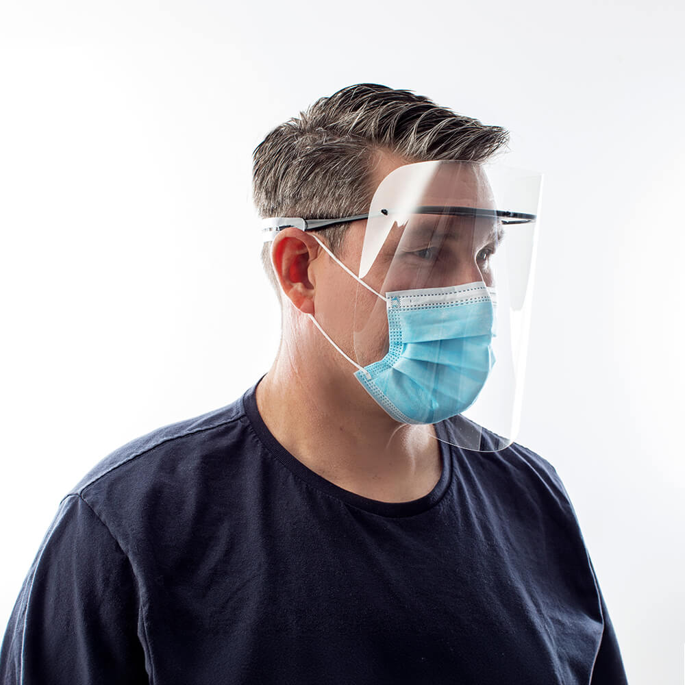 Female medical professional wearing face shield