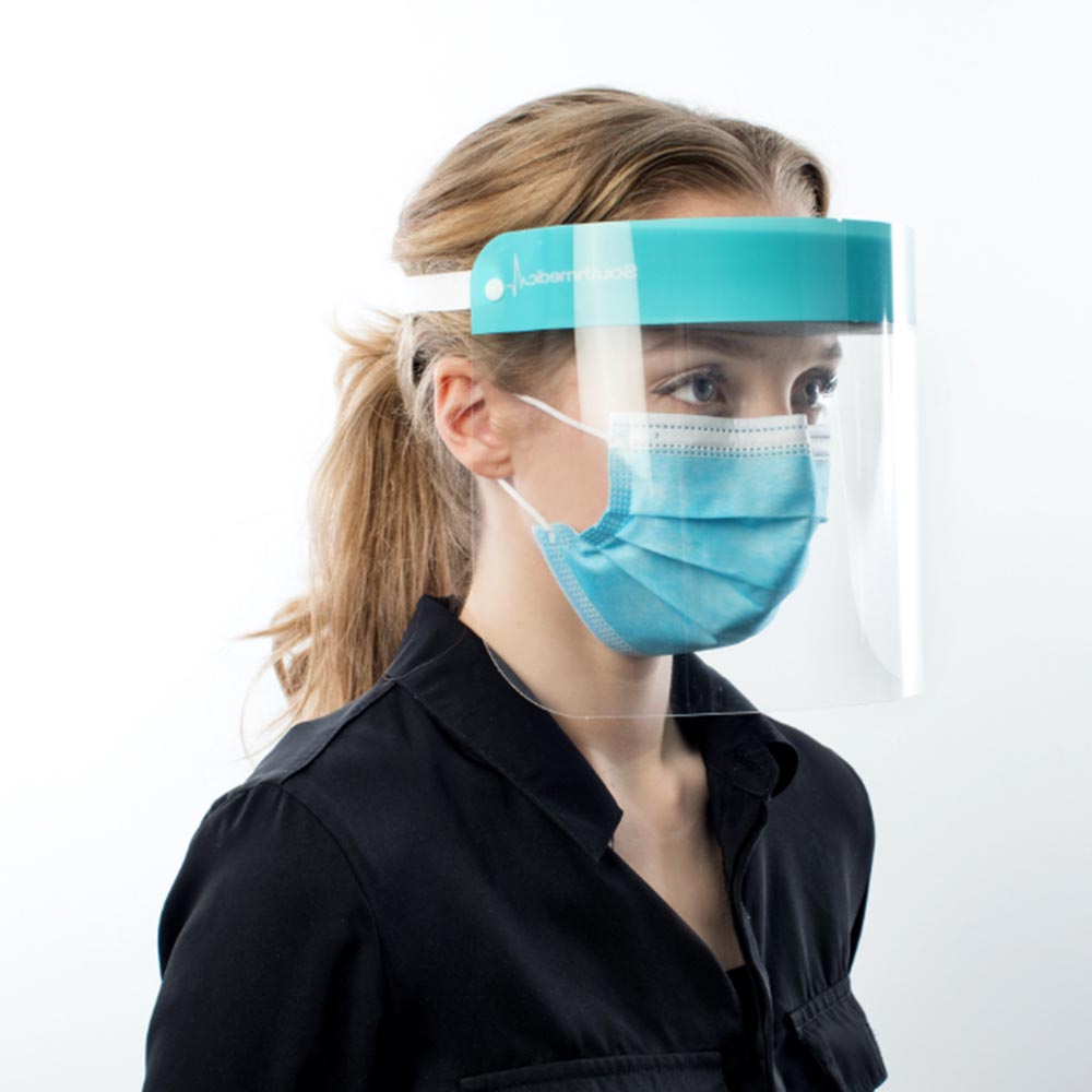 Female medical professional wearing face shield