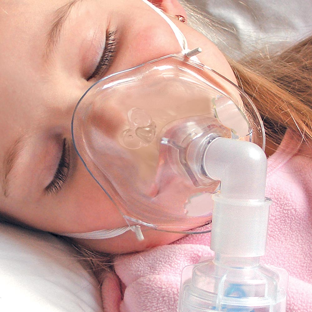 Close up of a child wearing an OxyMask™ Aerosol mask<br />
